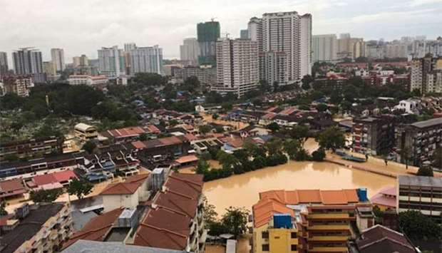 An aerial view shows a flooded residential area in George Town, Penang.