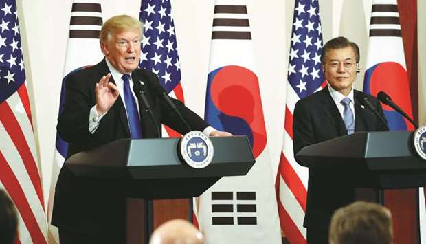 US President Donald Trump and South Koreau2019s President Moon Jae-in hold a joint news conference at the Blue House in Seoul.