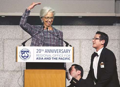 International Monetary Fund managing director Christine Lagarde attends a seminar to mark 20th anniversary of the launch of IMFu2019s Asia-Pacific Office in Tokyo yesterday. Lagarde said the diverging policy paths of major central banks had not led to massive and disruptive capital outflows in Asia, thanks to the cautious approach and clear communication by central bankers on their policy shifts.