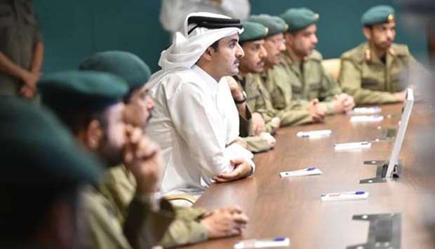 His Highness the Emir Sheikh Tamim bin Hamad al-Thani at the Emiri Guard buildings on Thursday.