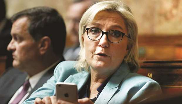 Le Pen: tweeted three pictures of IS violence in 2015.