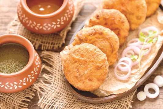 CRISPY: Pyaaz Kachori from Udaipur is bigger than a palm and is served with a tangy tamarind sauce. Photo by the author