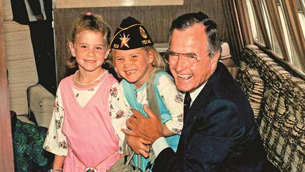 GREAT FUN: Barbara Bush, left, and Jenna Bush Hager with their grandfather George Bush.
