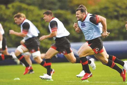 Englandu2019s scrum-half Danny Care (right) takes part in a training session in Bagshot, southwest of London yesterday, ahead of the autumn rugby union match against Argentina. (AFP)