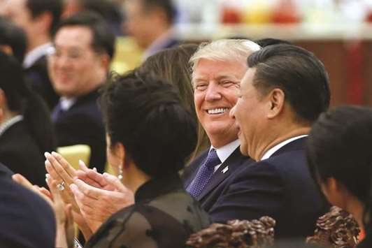 US President Donald Trump and Chinau2019s President Xi Jinping attend a state dinner at the Great Hall of the People in Beijing. Trump said China had to u201cimmediatelyu201d take greater action on market access, forced technology transfers and theft of intellectual property.
