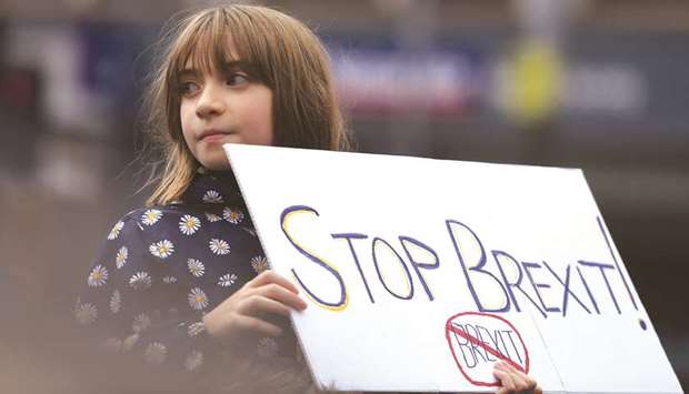A protester participates in an anti-Brexit demonstration at City Hall in central Belfast, Northern Ireland, on October 20, 2018.