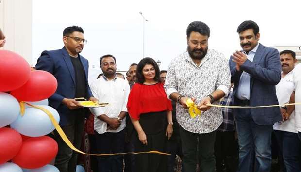 Mohanlal inaugurates the new branch of Music Lounge in Abu Hamour by cutting ribbon