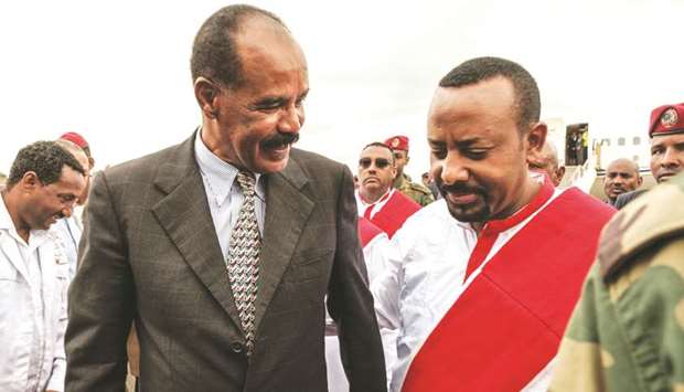 Ethiopiau2019s Prime Minister Abiy Ahmed welcomes Eritreau2019s President Isaias Afwerki upon his arrival at the airport in Gondar, for a visit in Ethiopia, yesterday.