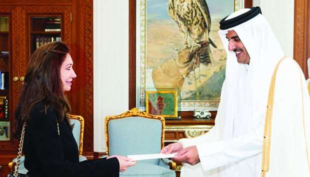 His Highness the Amir Sheikh Tamim bin Hamad al-Thani receives the credentials of Spain's ambassador to Qatar, Maria Belen Alfaro Hernandez, at the Amiri Diwan Wednesday. The ambassador conveyed to the Amir the greetings of her country's leader and his wishes of further progress and prosperity to the Qatari people. The Amir welcomed the new ambassador and wished her success in her duties and further growth in the relations between Qatar and Spain. Earlier, on arrival at the Amiri Diwan, the ambassador was accorded an official reception ceremony.