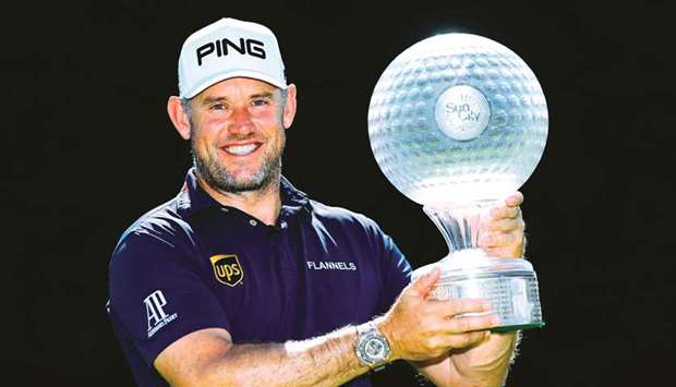 Lee Westwood of England poses with the trophy after  winning the Nedbank Golf Challenge at Sun City, South Africa.