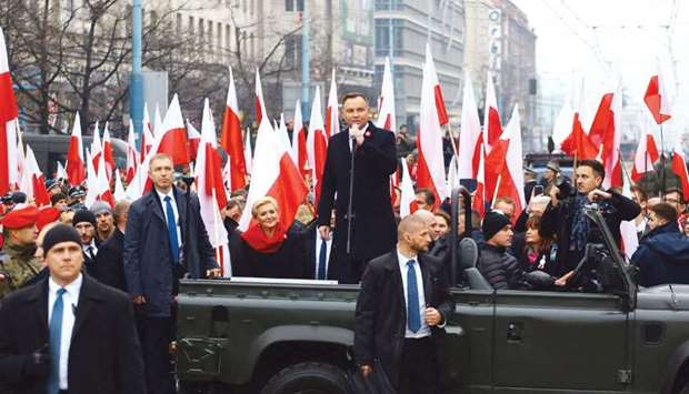President Andrzej Duda delivers a speech before the official start of a march in Warsaw marking the 100th anniversary of Polish independence.