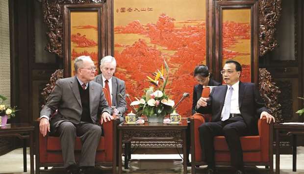 Chinau2019s Premier Li Keqiang (right) speaks next to Tennessee Senator Lamar Alexander during a meeting with a group of US Republican senators and Congress members at Zhongnanhai leadership compound in Beijing. The economic impact of the intensifying trade war between Washington and Beijing appeared to deepen last month with factory activity and export orders weakening across Asia, but analysts warned the worst was yet to come.