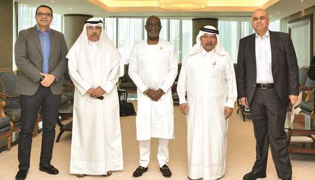 QBA chairman HE Sheikh Faisal bin Qassim al-Thani and Ghana Investment Promotion Centre CEO Yofi Grant with other senior officials after their meeting held at the QBA headquarters in Doha yesterday.