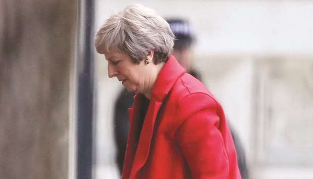Prime Minister Theresa May returns to Downing Street in London yesterday.
