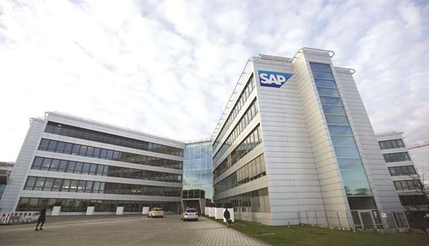 The SAP logo is seen on the exterior of the business-software makeru2019s headquarters in Walldorf, Germany. SAP has agreed to buy Qualtrics International for $8bn in cash, pre-empting a planned stock market listing by the US-based company which specialises in tracking online sentiment.