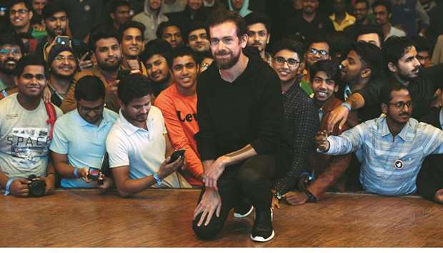 Twitter CEO and co-founder Jack Dorsey poses with students after an interaction session at the Indian Institute of Technology (IIT) in New Delhi yesterday.