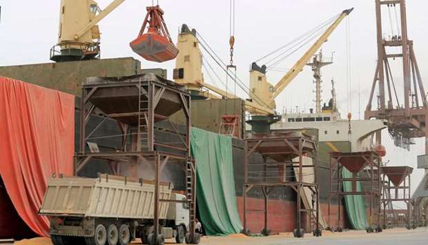 A shipment of grain is unloaded at the Red Sea port of Hodeidah, Yemen on August 5, 2018