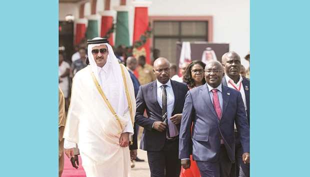 His Highness the Amir Sheikh Tamim bin Hamad al-Thani is welcomed by Ghanaian President Nana Akufo-Addo upon arrival at the presidential palace in Accra in December 2017.