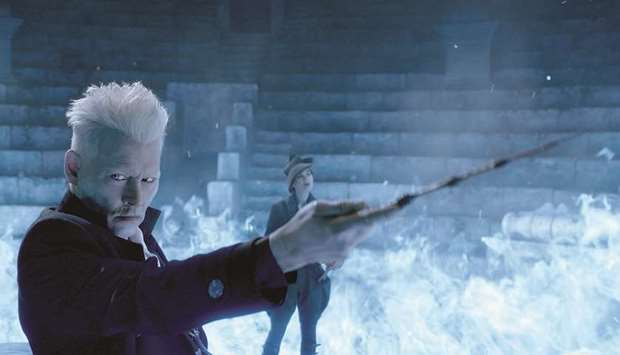 MAGICAL: Johnny Depp, left, as Grindelwald and Poppy Corby-Tuech as Rosier in Warner Bros. Picturesu2019 fantasy adventure Fantastic Beasts: The Crimes of Grindelwald.