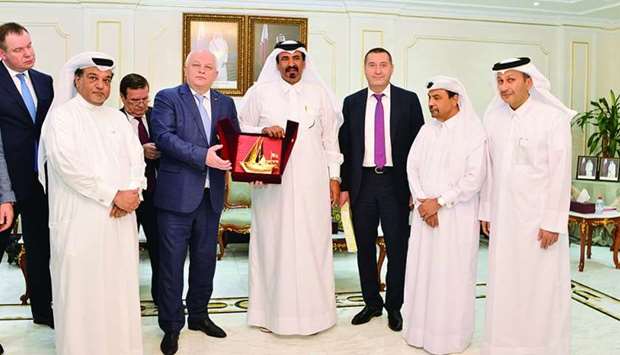 Ukrainian Deputy Prime Minister and Minister of Economic Development and Trade Stepan Kubiv receiving a token of recognition from Qatar Chamber first vice-chairman Mohamed bin Towar al-Kuwari.