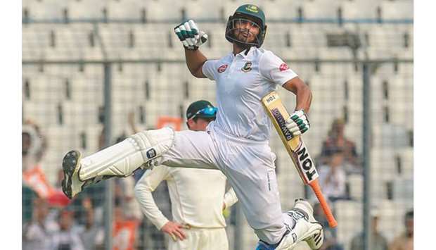 Bangladesh's batsman Mahmudullah is over the moon after scoring a century during the fourth day of the second Test against Zimbabwe in Dhaka. (AFP)