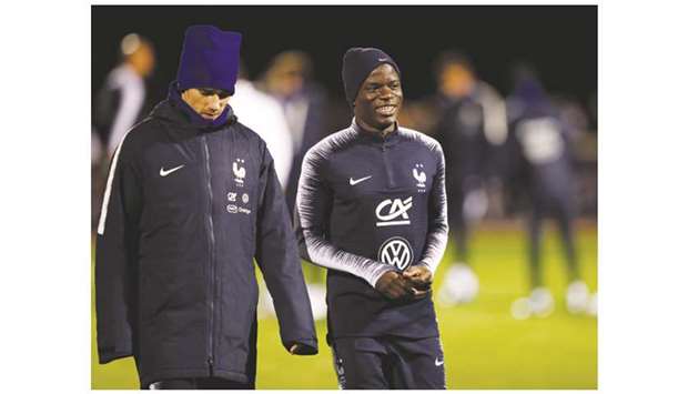 Franceu2019s Nu2019Golo Kante (right) and Antoine Griezmann at a training session in Clairefontaine, France yesterday. (Reuters)
