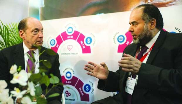 CEO of Qatar Charity (QC) Yousef bin Ahmed al-Kuwari talking to an official at the AidEx 2018 event, being held in the Belgian capital Brussels.