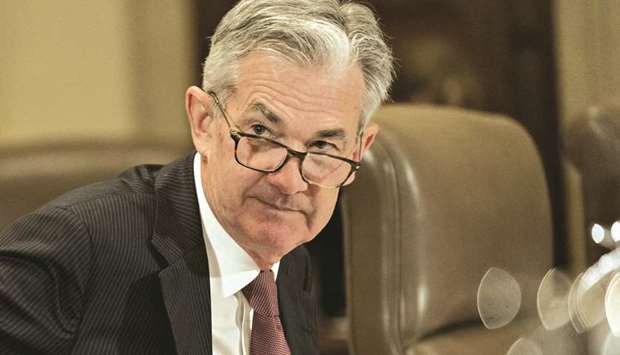 Federal Reserve chairman Jerome Powell arrives to a Fed Board meeting in Washington, DC. on October 31. While generally upbeat about the US economic outlook, Powell has listed potential challenges including slowing demand abroad, fading fiscal stimulus and the lagged effect on the economy of the Fedu2019s eight rate increases since late 2015.