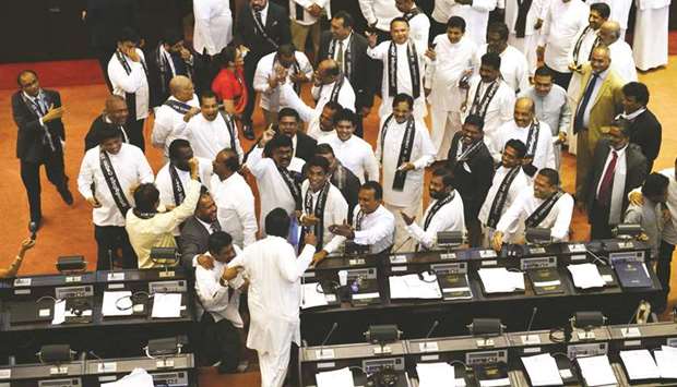 A total of 122 legislators in the 225-member assembly supported the no-confidence move against Rajapakse. It was nine more than the mandatorily required 113.