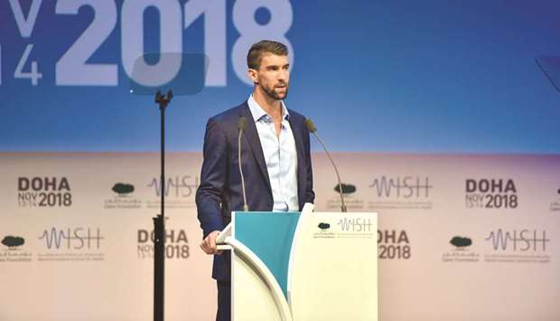 Michael Phelps speaking at the event.