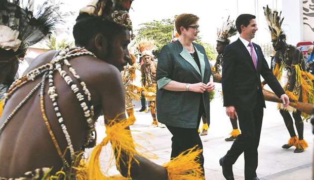 Australiau2019s Foreign Minister Marise Payne (centre) arrives for the 30th Asia-Pacific Economic Co-operation (Apec) ministerial meeting in Port Moresby yesterday.