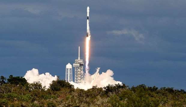 A SpaceX Falcon 9 rocket launches Qataru2019s Esu2019hail-2 communications satellite from Launch Pad 39A at the Kennedy Space Centre