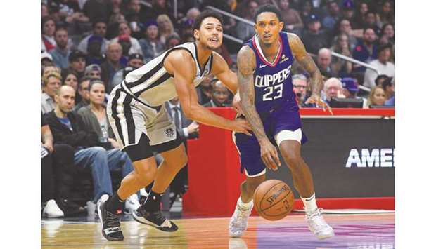 San Antonio Spursu2019 Bryn Forbes (left) defends Los Angeles Clippersu2019 Lou Williams as he drives to the basket in the second half of the game at Staples Center in Los Angeles, California, on Thursday. (USA TODAY Sports)