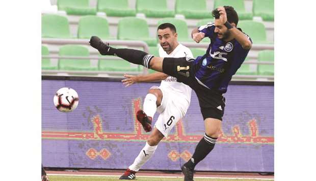 Al Saddu2019s Xavi in action during the QSL Cup third round match against Al Sailiya.