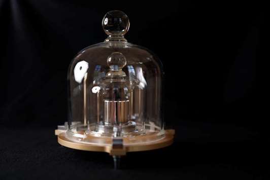 A replica of the International Prototype kilogram is pictured at the International Bureau of Weights and Measures (BIPM) in Sevres near Paris.