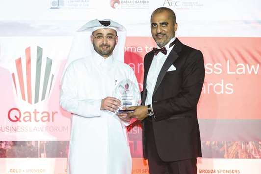 QFC chief legal officer and board secretary Nasser al-Taweel receives the u2018General Counsel of the Yearu2019 award at the Qatar Business Law Forum & Awards.