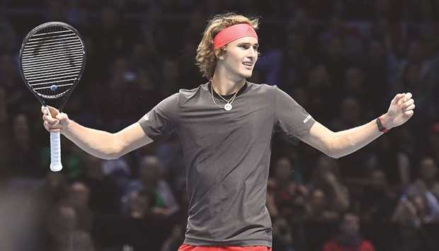 Germanyu2019s Alexander Zverev celebrates winning against Switzerlandu2019s Roger Federer during their singles semi-final on day seven of the ATP World Tour Finals at the O2 Arena in London yesterday. (AFP)