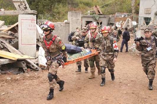 US Army and Chinau2019s PLA military personnel take part in an exercise of Disaster Management Exchange near Nanjing, Jiangsu province, China, yesterday.