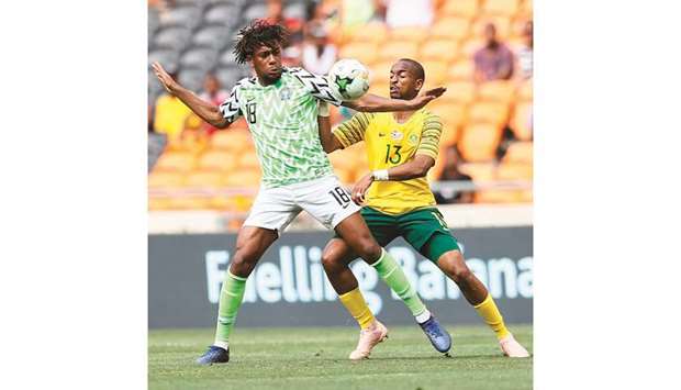 South Africau2019s Tiyani Mabunda (right) and Nigeriau2019s Alexander Iwobi vie for the ball during the African Cup of Nations qualifier in Johannesburg yesterday. (AFP)
