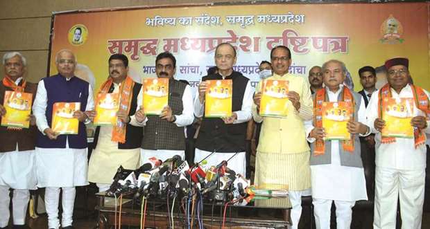 Finance Minister Arun Jaitley and other BJP leaders release the partyu2019s manifesto for the upcoming Madhya Pradesh assembly elections in Bhopal yesterday.