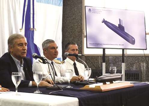 Argentinau2019s Defence Minister Oscar Aguad, Navy Chief Jose Villan and Captain Enrique Balbi attend a news conference at Libertad Building in Buenos Aires yesterday.