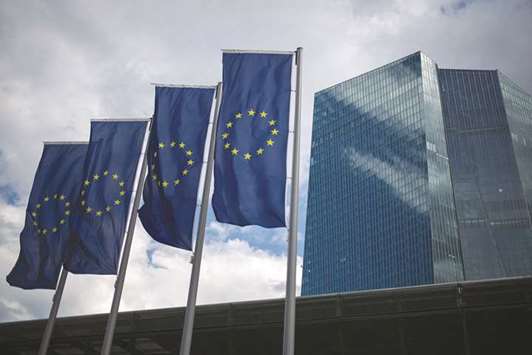The stars of the European Union (EU) are seen on banners flying outside the European Central Bank headquarters in Frankfurt. Negotiators representing EU governments and the European Parliament may agree on draft legislation to screen foreign direct investments on November 20, according to Franck Proust, a French member of the 28-nation assembly.