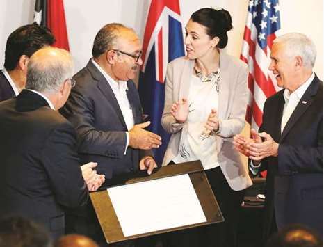 Papua New Guineau2019s Prime Minister Peter Ou2019 Neill, US Vice President Mike Pence, Australiau2019s Prime Minister Scott Morrison, New Zealandu2019s Prime Minister Jacinda Ardern and Japanu2019s Prime Minister Shinzo Abe applaud during the signing of a joint electricity deal between Australia, Japan, New Zealand, United States for Papua New Guinea, during the Apec Summit in Port Moresby.