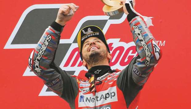 Ducati Teamu2019s Andrea Dovizioso celebrates winning the MotoGP season finale at the Valencia Grand Prix yesterday. (Reuters)