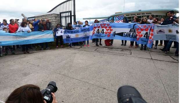 Relatives of the 44 crew members of the missing at sea ARA San Juan submarine attend a demonstration outside the Argentine Naval Base where the submarine sailed from, in Mar del Plata, Argentina