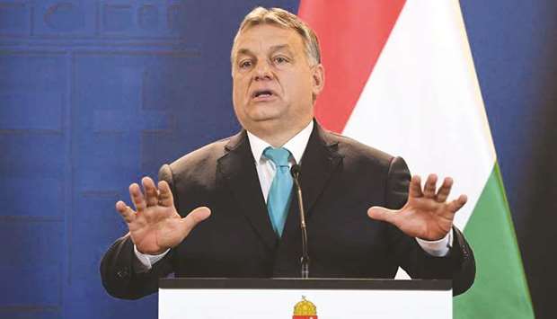 Prime Minister of Hungary Viktor Orban gestures as he gives a press conference at the Hungarian parliament in Budapest on earlier this year.