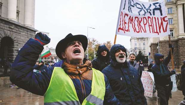 Protesters take part in a demonstration against a hike in fuel prices in Sofia.