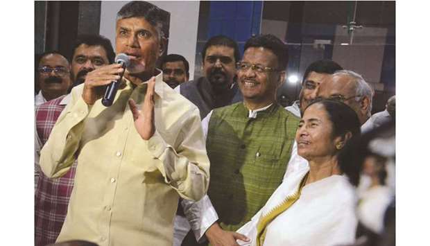 Andhra Pradesh Chief Minister N Chandrababu Naidu speaks to reporters as West Bengal Chief Minister Mamata Banerjee and other leaders look on yesterday.
