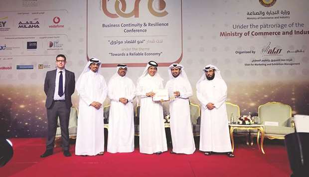 Vodafone Qatar director of External Affairs Mohamed al-Yami receiving the award during yesterdayu2019s conference.