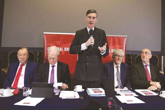 Conservative MP Jacob Rees-Mogg takes questions during a joint press conference of the European Research Group and Global Britain in central London yesterday.